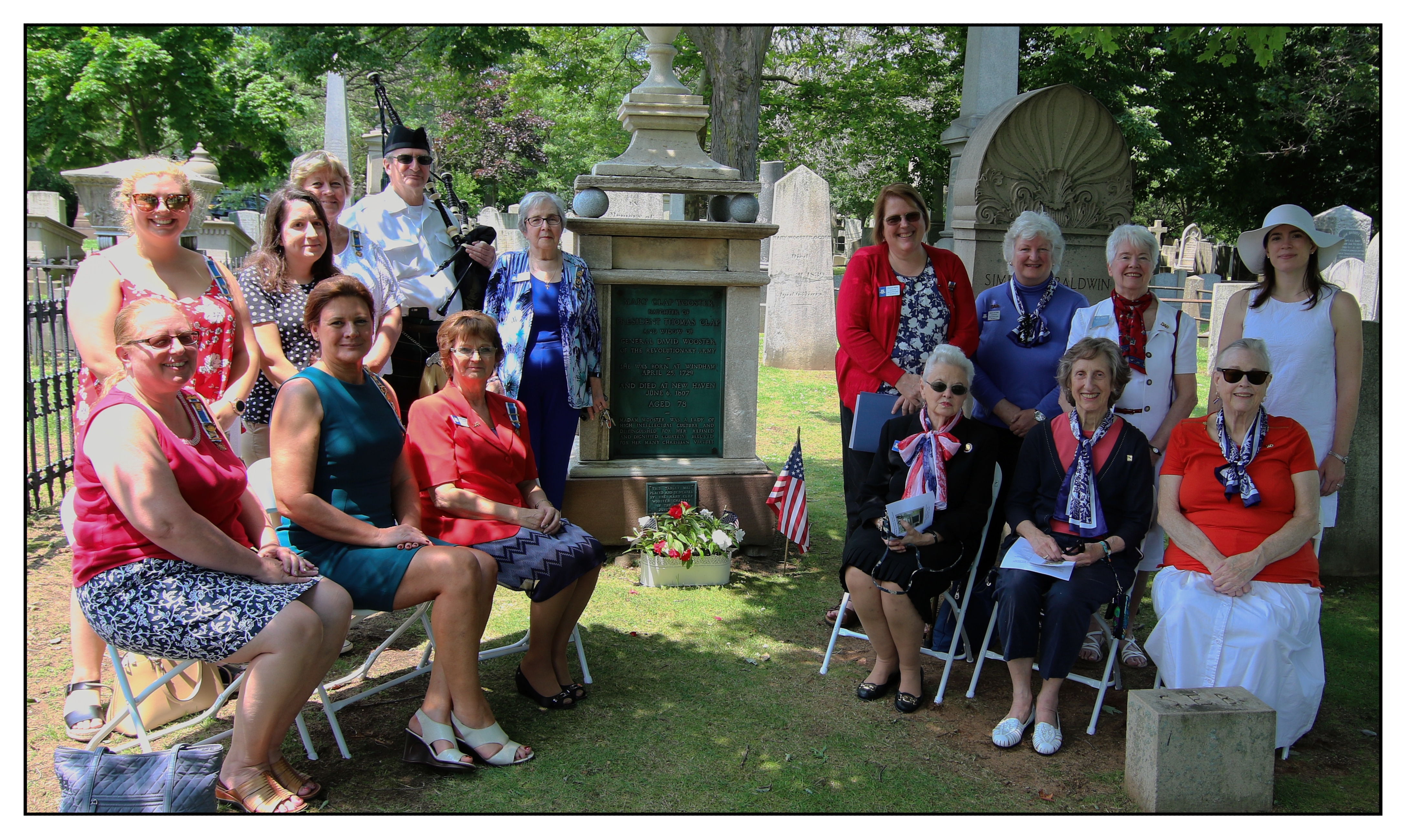 Chapter with Patricia Buxton and piper at Mary Clap Wooster Chapter NSDAR monument rededication, June 22, 2019.